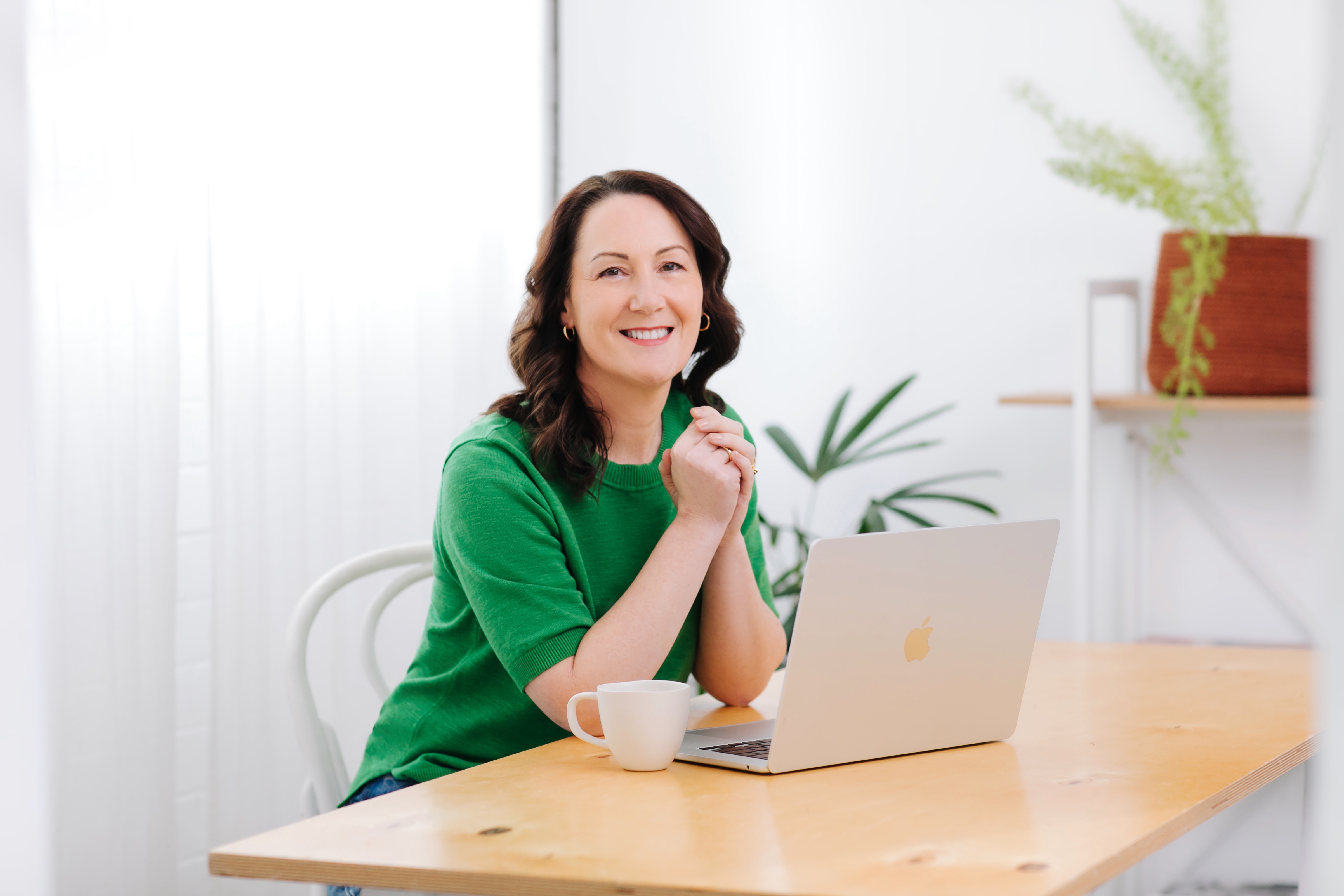Tanya Scott writing at a desk